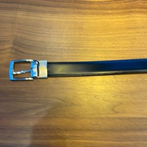 Mens dress belt. Reversible black/brown leather with silver buckle sz 38